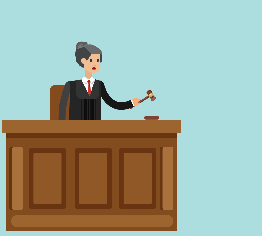 A woman wearing a robe who is a judge stands behind a desk holding a wooden hammer.