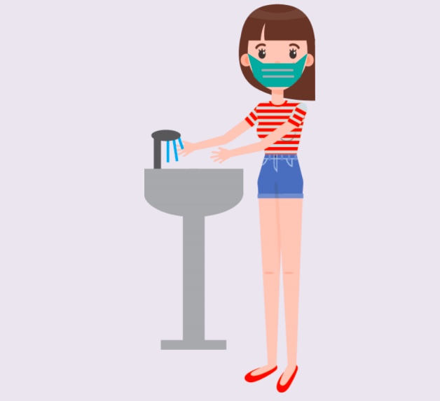 A girl wearing a mask washing her hands.