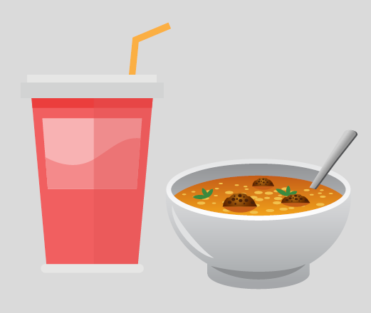 A drink with a straw and a bowl of soup with a spoon.