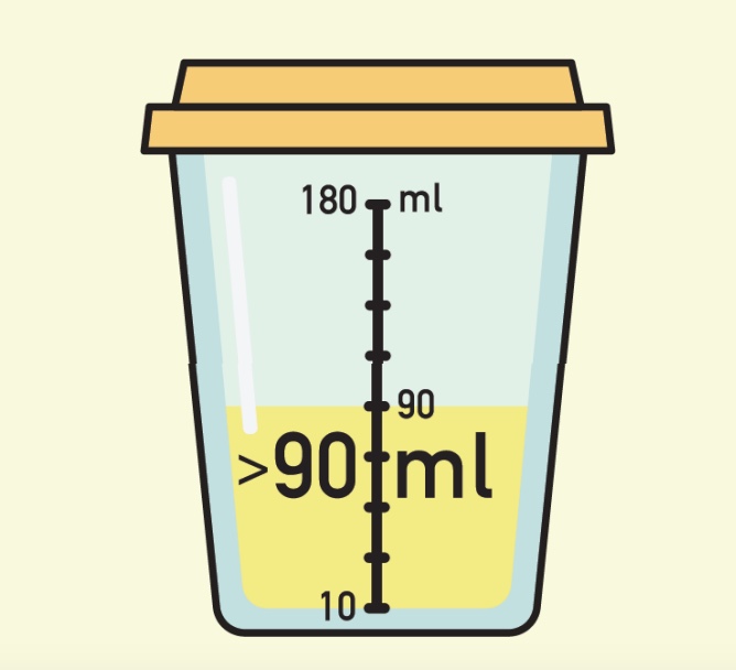 A plastic cup with milliliter markings.